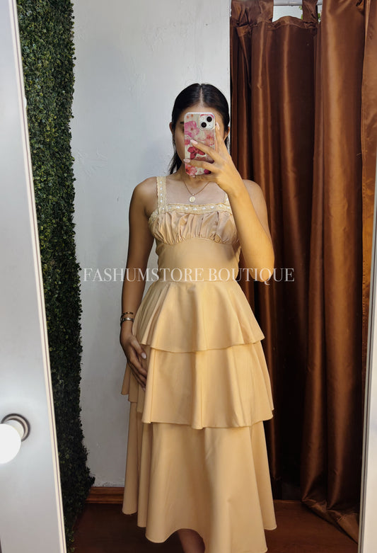 Vestido beige con olanes